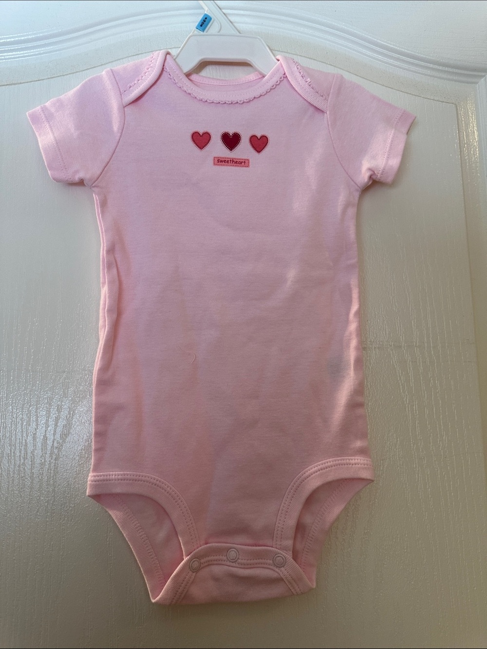 Carter's Light Pink Onesie with Red Heart Accents